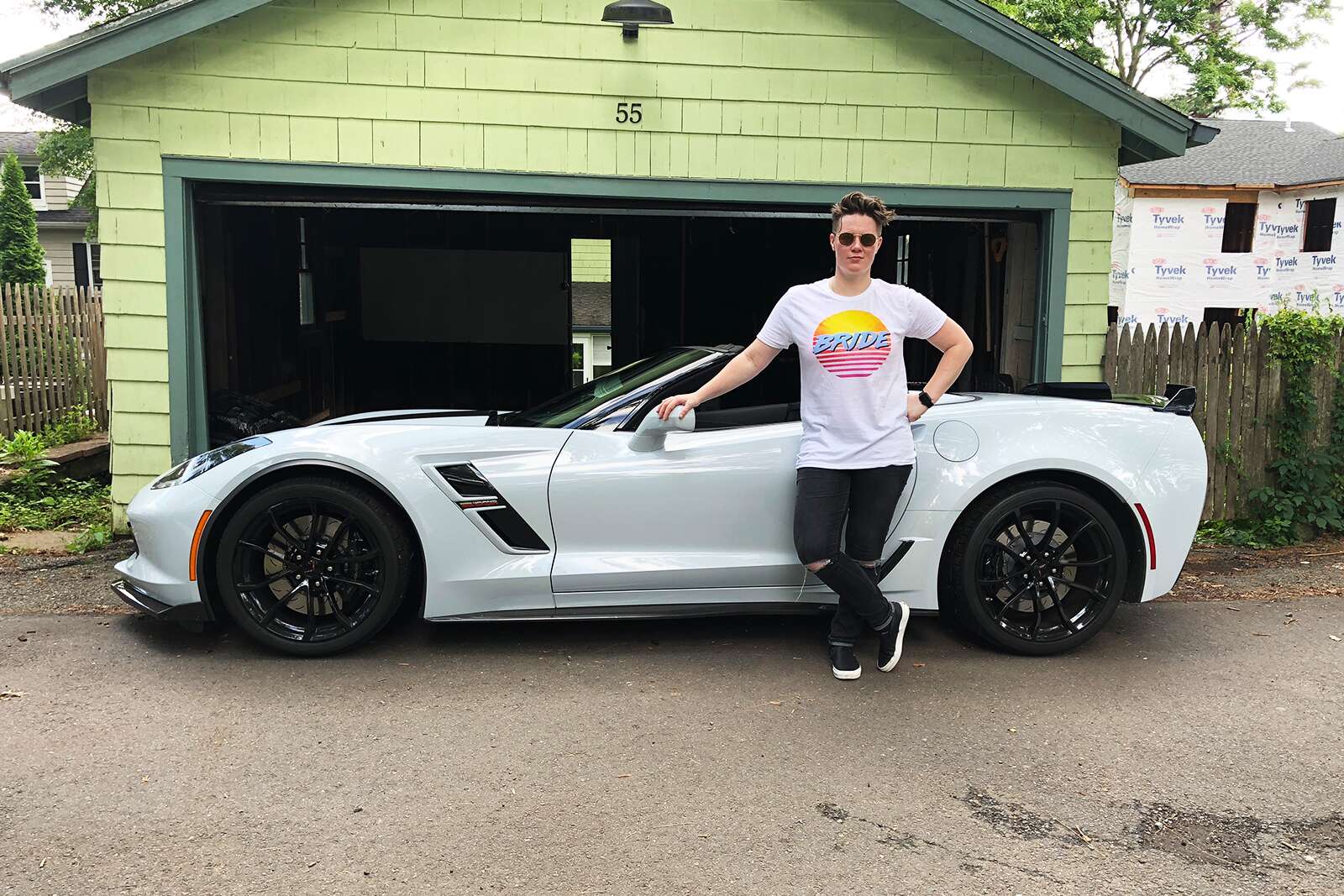 standing in front of 2019 Chevrolet Corvette Grand Sport Convertible