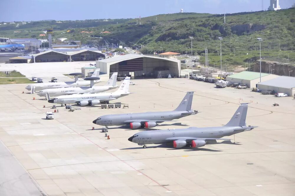 Front to back, two US Air Force E-3 Sentry Airborne Warning and Control System (AWACS) radar planes, an RC-135V/W Rivet Joint, and two KC-135R Tankers at the US forward operating location on the Dutch island of Curaçao.