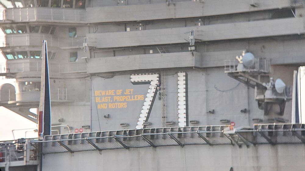 The ship's barricade risers are erected on the USS Theodore Roosevelt during Top Gun 2 two production.